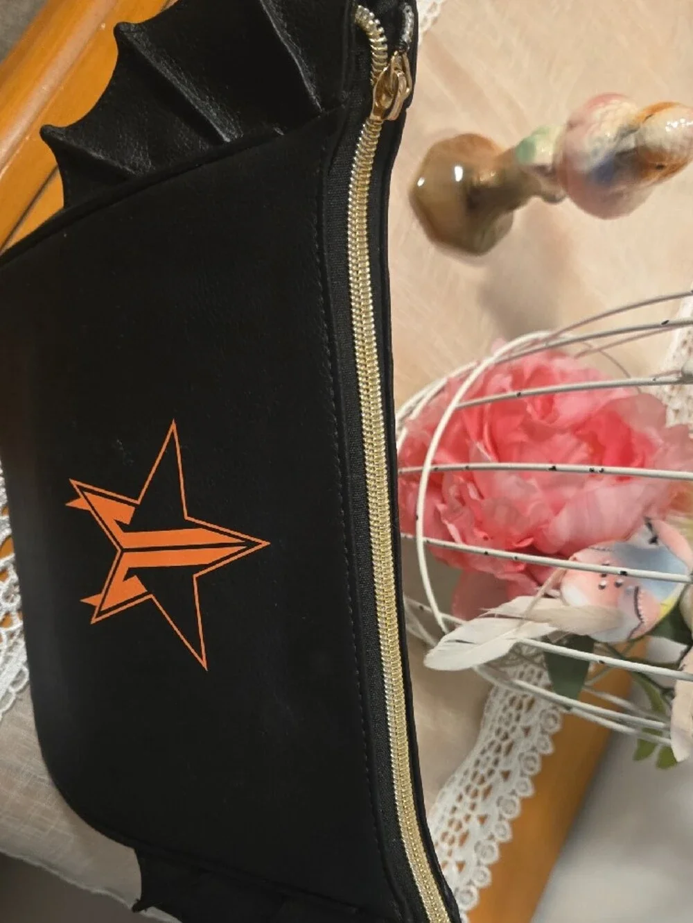 Jeffree Star Black Cosmetic Bag with Orange Star Accent
